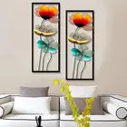 Arte mural floral de metal pintado a mano de Oriflame (84 x 30 cm)