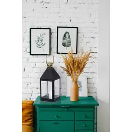 Linterna de vela modesta de metal hecha a mano