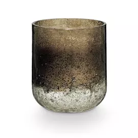 Duftkerze im Glas mit holziger, brauner Struktur und Glashalter