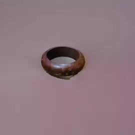 Armring i trä och mässing