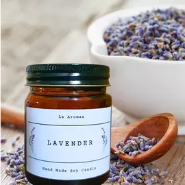 Vela con aroma a lavanda en tarro de color ámbar