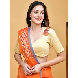 Blusa de algodón amarilla con bordado floral - La Saga del Azafrán