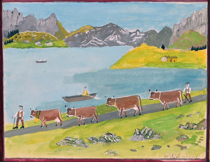 Alpine herdsmen in front of lake and mountains