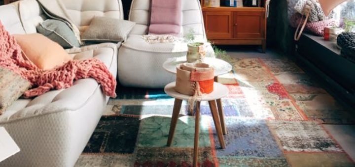 cozy sofa with cushions and a small table