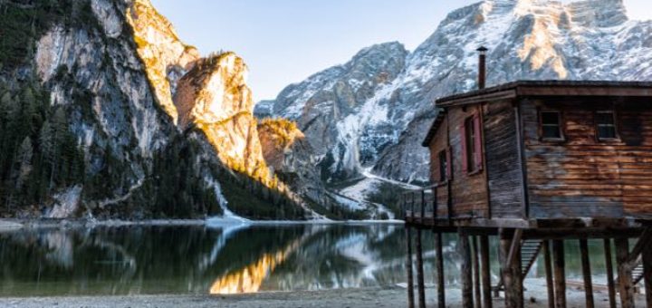 picturesque mountain lake with a cottage