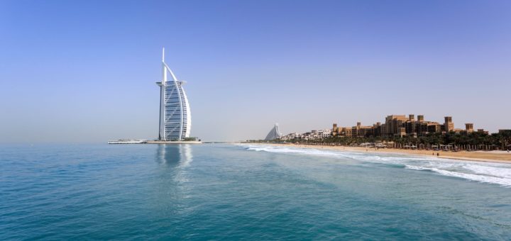 burj kalifa with a stretch of beach in Dubai