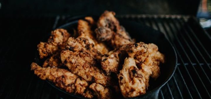 peaces of grilled chicken in a pan