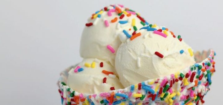 vanilla ice cream with rainbow sprinklers in a bowl image curve