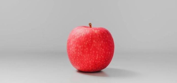 red apple on a gray background