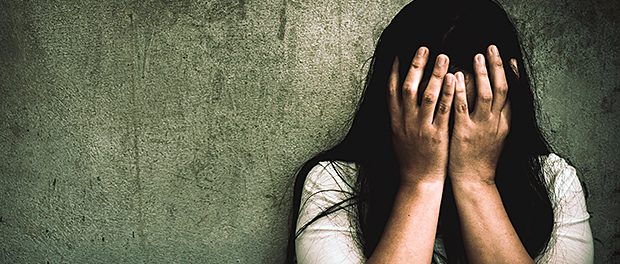 A woman sitting alone and depressed. The depression woman sit on