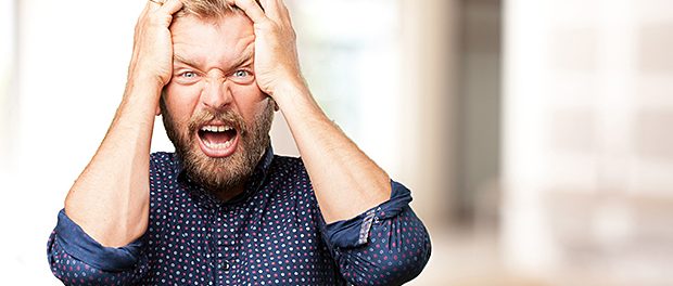 blond man angry expression