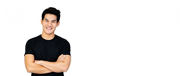 Handsome Asian man in casual black t-shirt with arm crossed