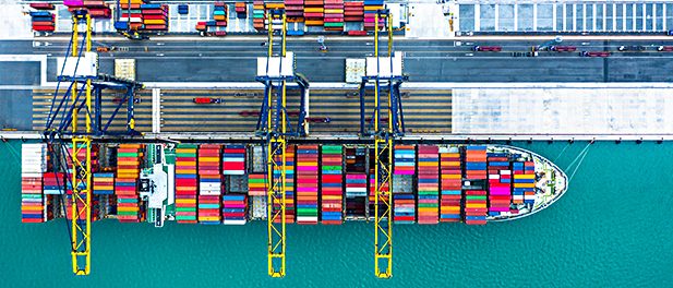 Container ship arriving in port, container ship loading at deep