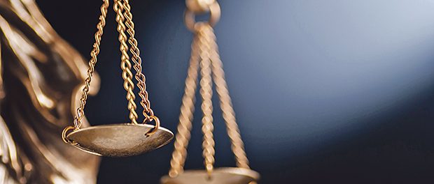 Close up on the scales of justice