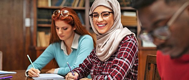 Islamic student at library