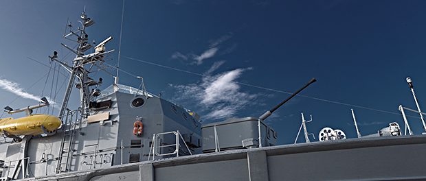 Armed military or coast guard rescue ship with guns