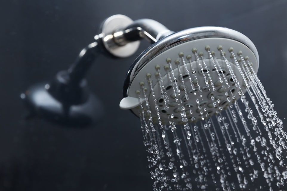 waterbesparende douchekop douchestop knop