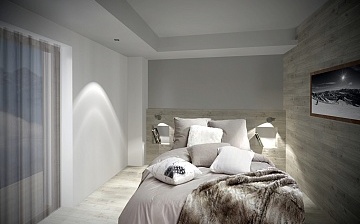 Ferienwohnung Chalet Nuance in Alpe d‘Huez 1450 · Schlafzimmer mit französischem Doppelbett Ferienwohnung Chalet Nuance in Alpe d‘Huez 1450 · Schlafzimmer mit französischem Doppelbett