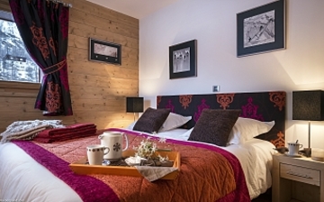 Ein Schlafzimmer im Panorama Vars 2000 direkt in Vars - Les Claux, Frankreich. Ein Schlafzimmer im Panorama Vars 2000 direkt in Vars - Les Claux, Frankreich.