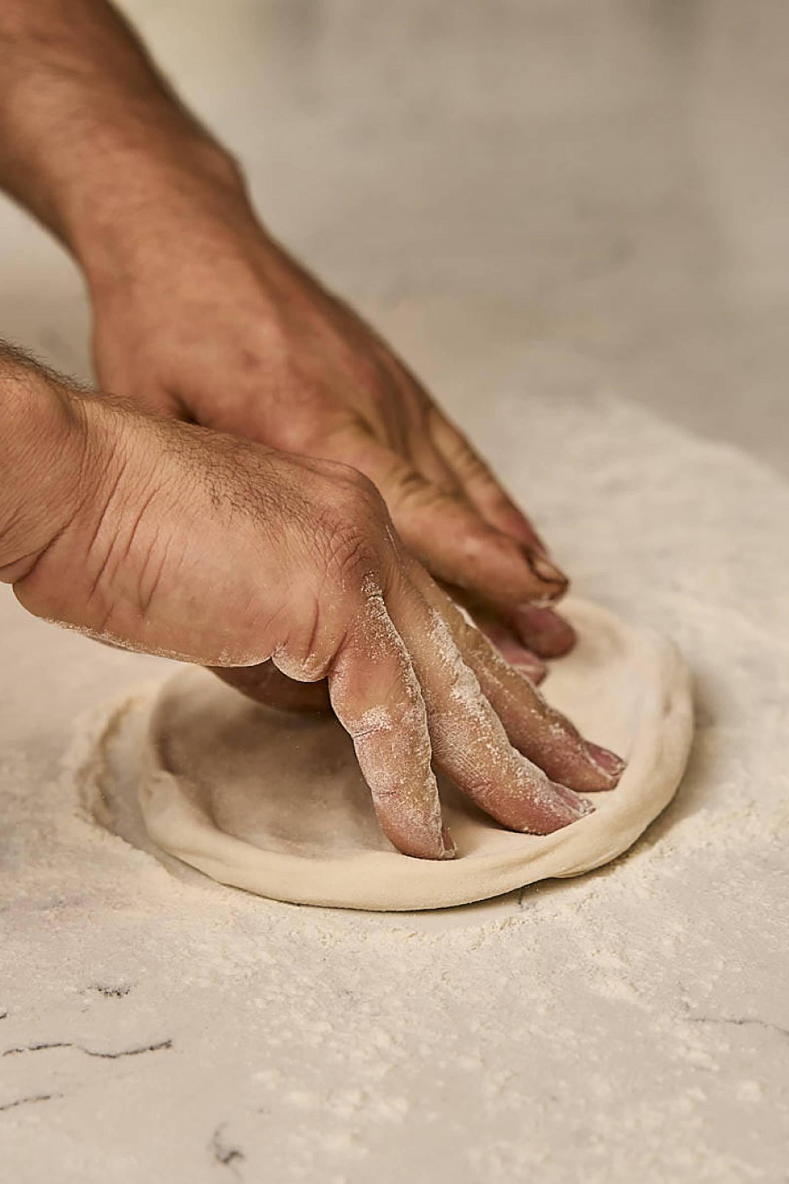 Famous for its thin-crust, Naples-style pizza that comes straight from the wood-oven, frosted with the freshest ingredients, but also for its amazing pasta fresca (fresh pasta), which is made daily in-house with only the best of local produce. - Image