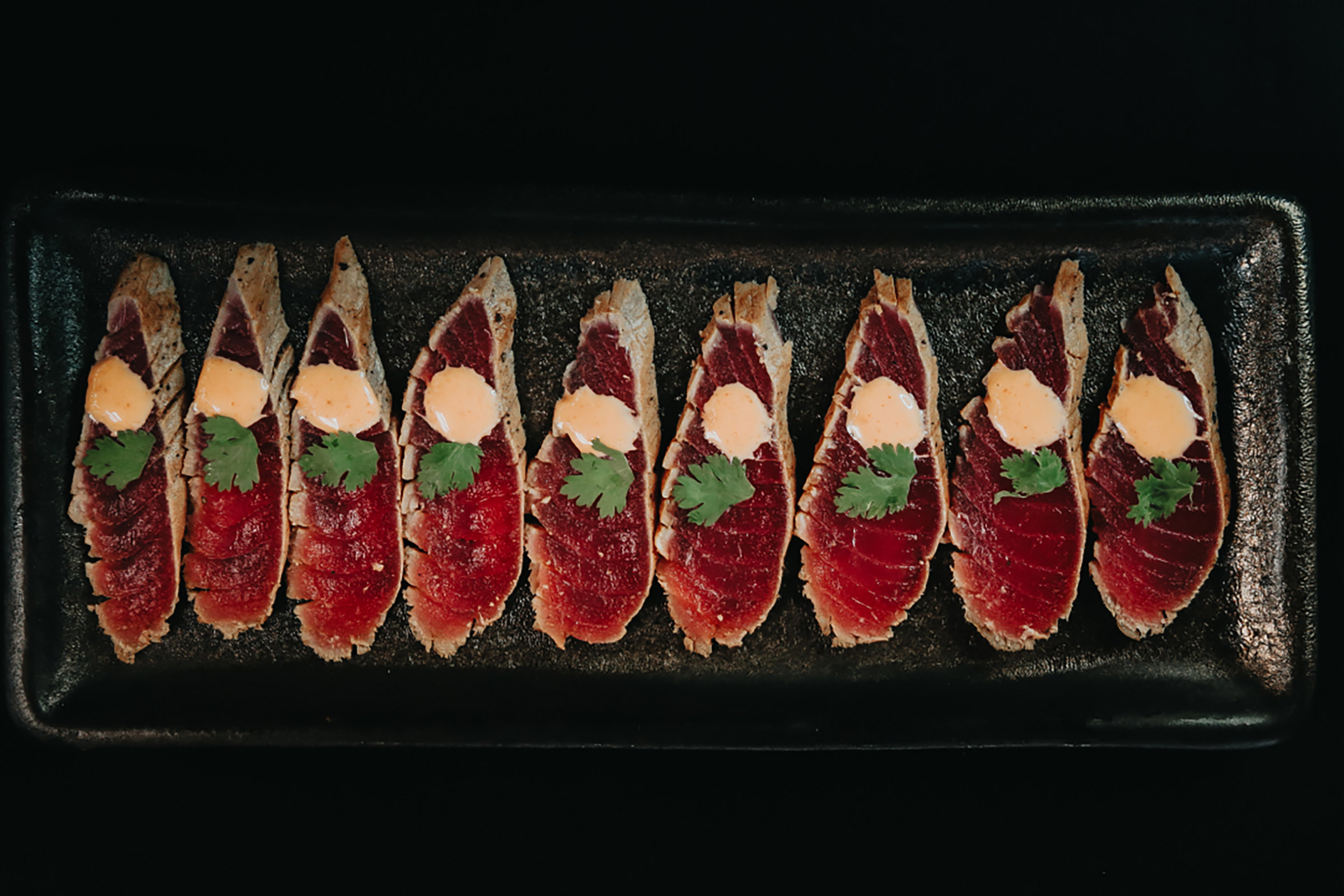 The most premium ingredients are transformed into sophisticated dishes ready to impress even the most demanding globe traveller, from ceviche, tartar and tiradito to world-class sushi and prime cuts, all paired with fine cuvees, rare labels, and of course top sake brands. - Secondary Image