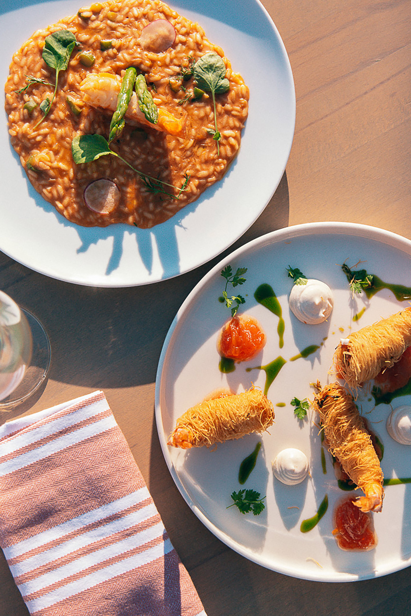 Here the well-known Pacha “pool scene” with the restaurant, the lounge and the bar, captures the very spirit of Ibiza and blends it with the unique Greek-island summer lifestyle. - Image