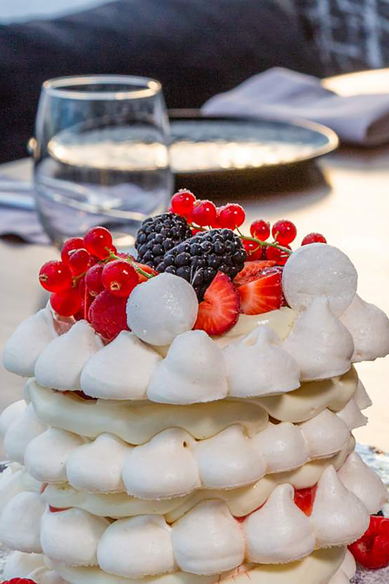 Here fine dining and drinking is combined with special DJ guests and glamorous parties, while the mesmerising view serves as the perfect background to the much-promising nights of the island of the winds. Greek gastronomic delights are the way to start your evening, paired with fine wines and champagne, while the best bartenders on the island await at the Remezzaki small terrace to please your most extravagant drinking wishes. - Image