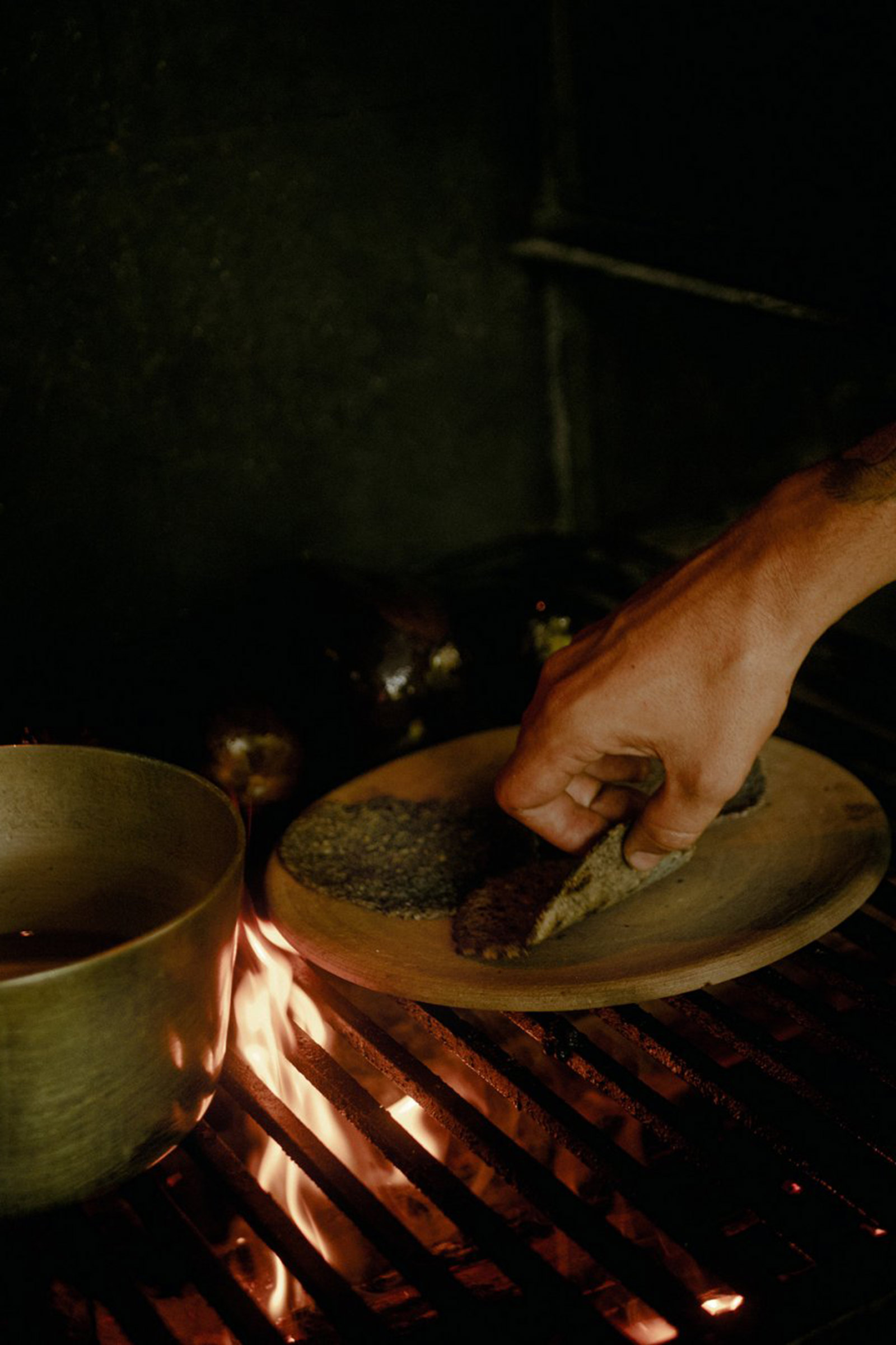 The corn is finely grounded with the use of a traditional stone mill and is prepared with culinary techniques dating all the way back to the pre-Hispanic times, even using ancient forms of fermentation. - Image