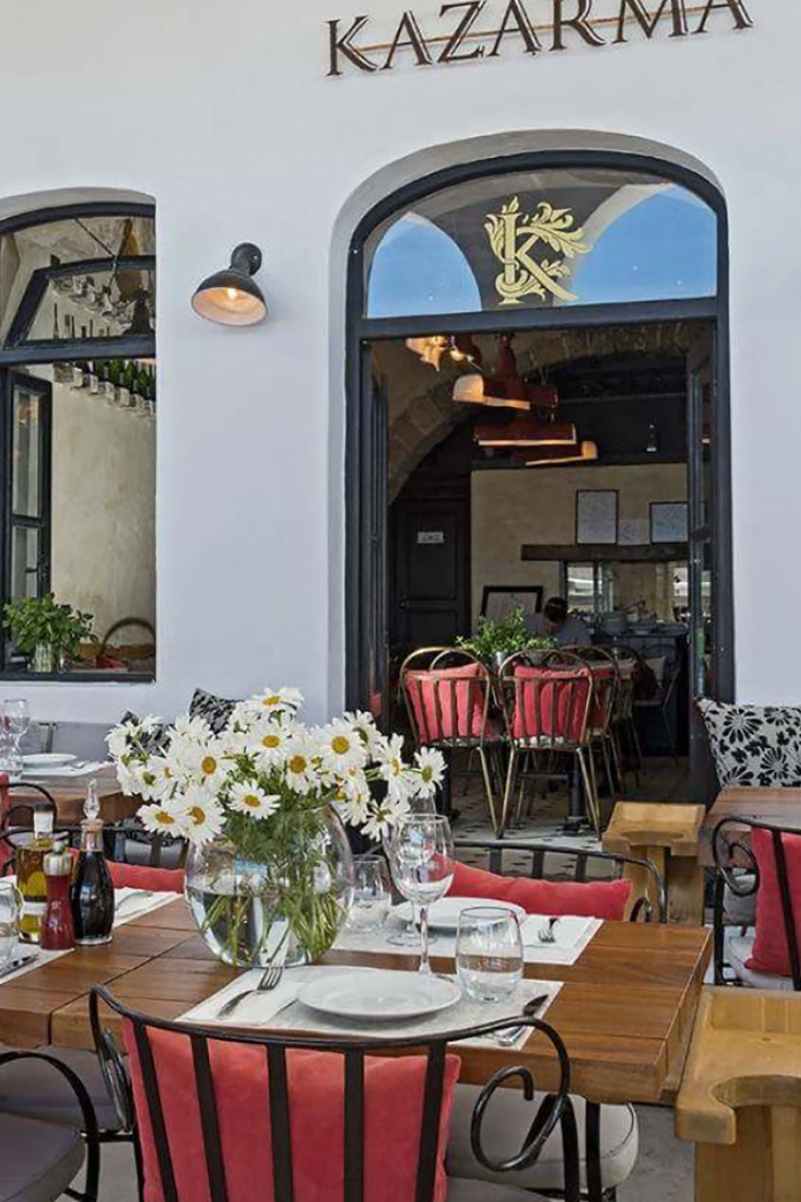 The building hosting this beautiful all-day bar restaurant for over two decades now is of huge historical significance to the island, as it belonged to heroine of the Greek War of Independence Manto Mavrogenous, a revolutionary soul who spent her entire fortune for the Hellenic cause. - Image