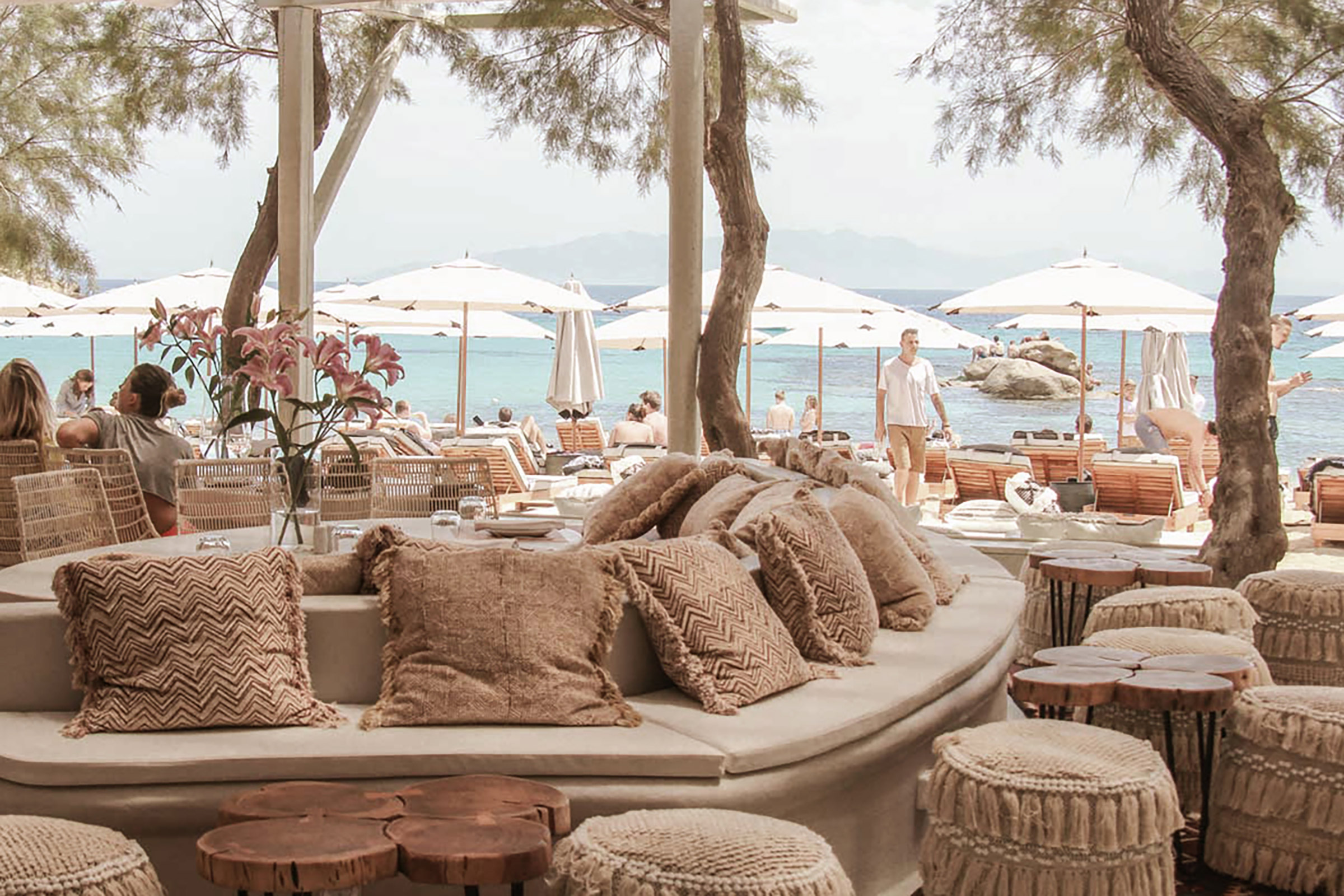 The restaurant serves Mediterranean and Asian cuisine, complemented by a strong wine-list and panoramic sea and beach views. - Secondary Image