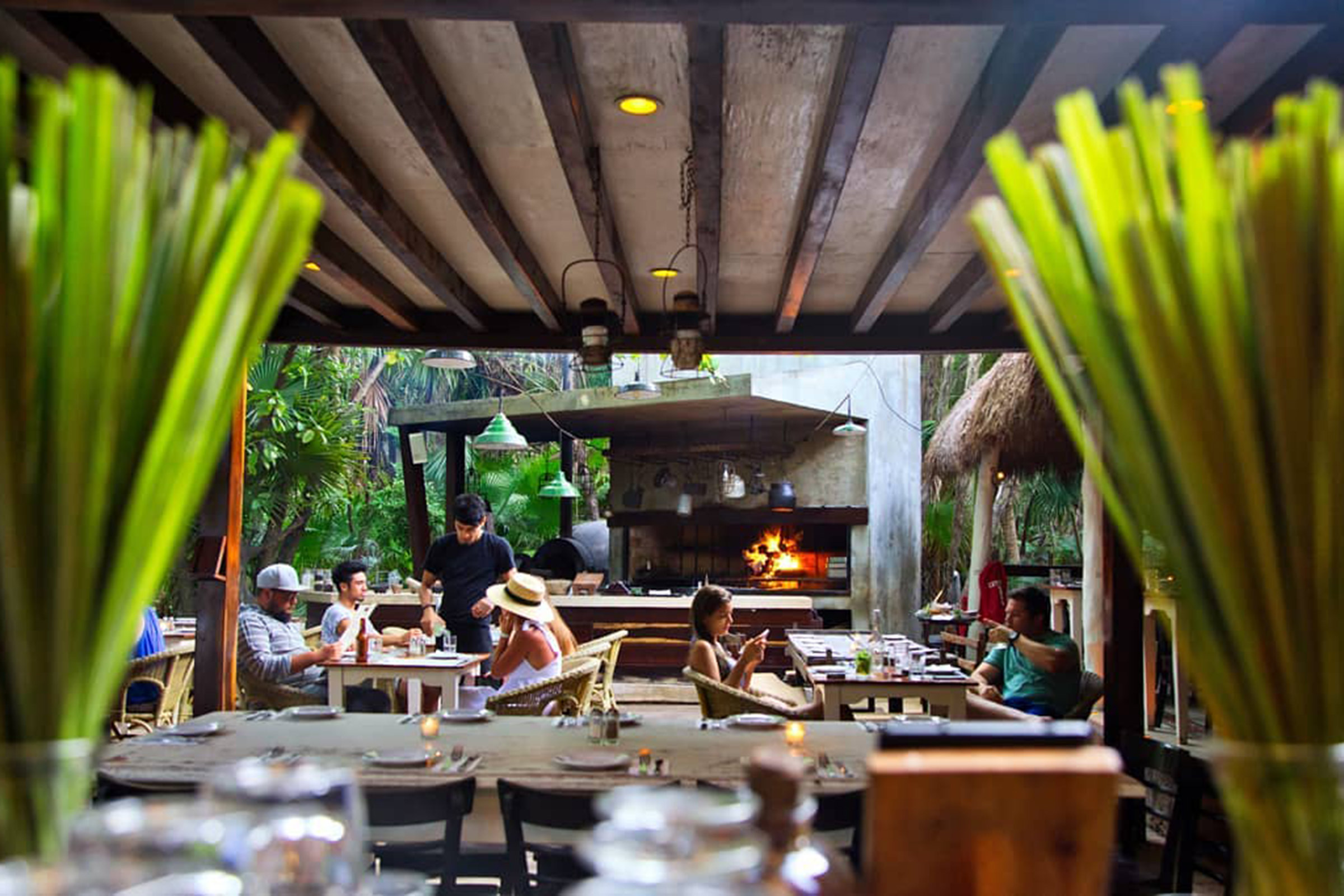 An Argentinian grill house in the heart of the Tulum jungle promises exquisite -mainly- carnivorous experiences that will certainly please the palate of the foodie crowd visiting the area. - Secondary Image