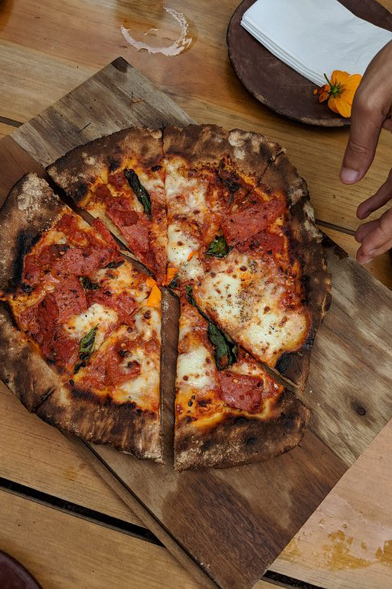 Its contemporary interiors display the exotic flair of its location, surrounded by lush vegetation and using natural materials. Its creative Italian & Mediterranean menu is designed of course by 2 Michelin starred chef Nino Di Constanzo, responsible for the menu of all the restaurants of the famous brand, while the talented chefs de cuisine make sure to keep the highest level of creativity alive in their kitchen. - Image