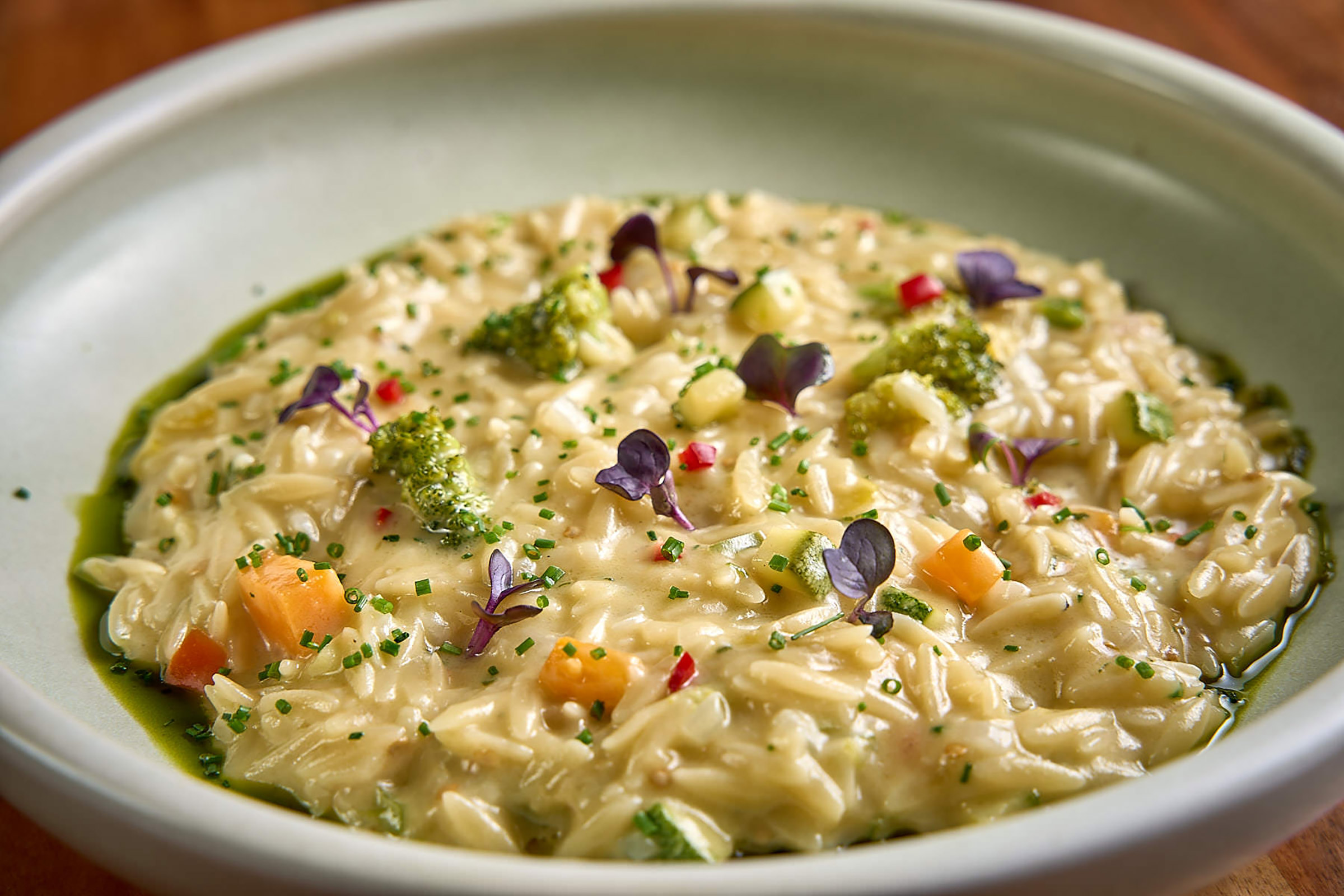 From the traditional Greek salad to the tarama spread with black caviar, from the local trahanas soup with feta cheese to the Rib Eye Black Angus, and from the shrimp risotto with chorizo and sweet pumpkin to the artistically grilled catch of the day, Raya Restaurant brings together tradition and innovation in an exciting culinary project. - Secondary Image