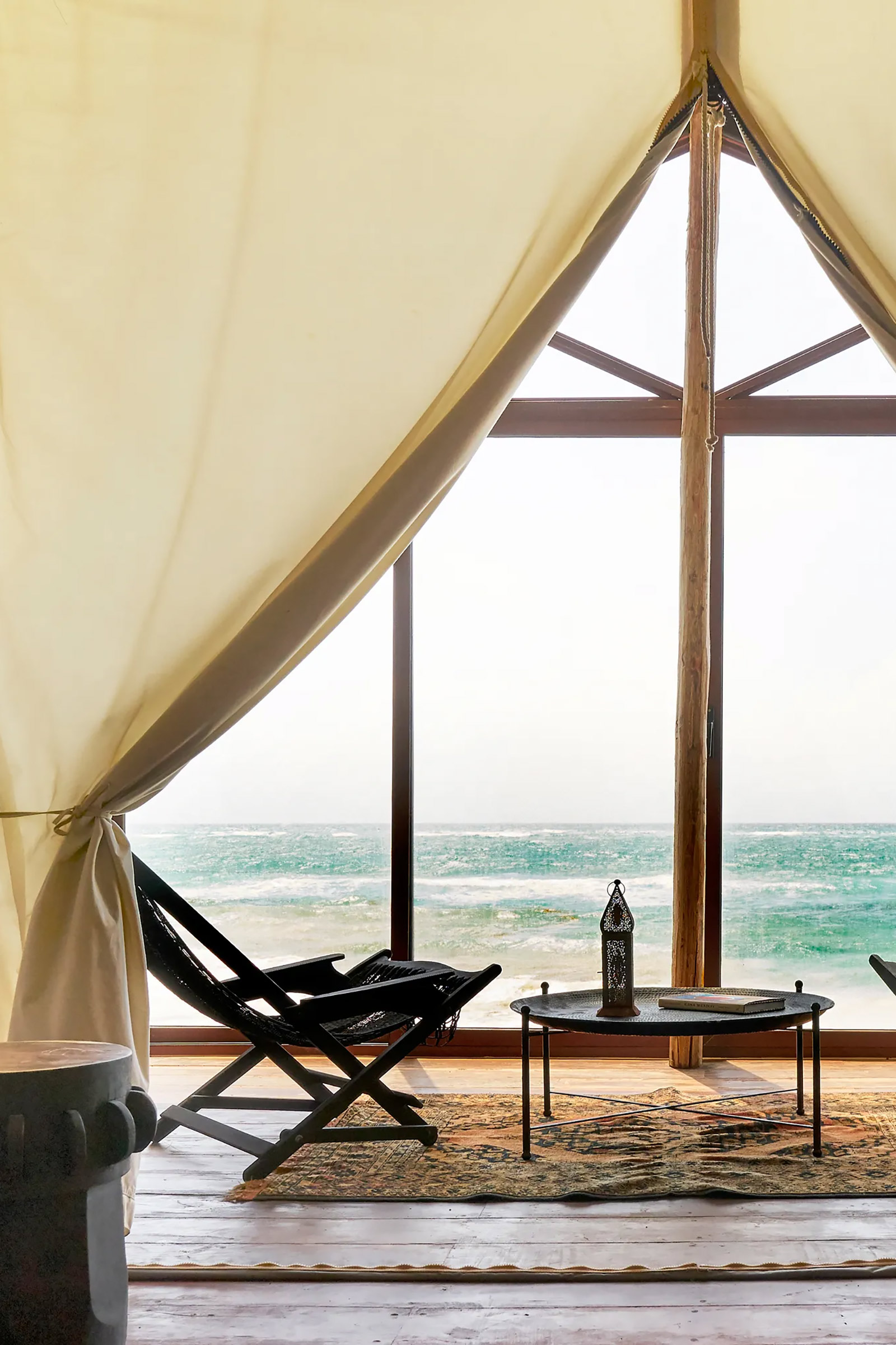 Palapa roofs, canvas walls, outdoor rain showers, extent use of local wood and wicker give the tempo for a cosy home-away-from-home totally blending in with the surrounding landscape. - Image