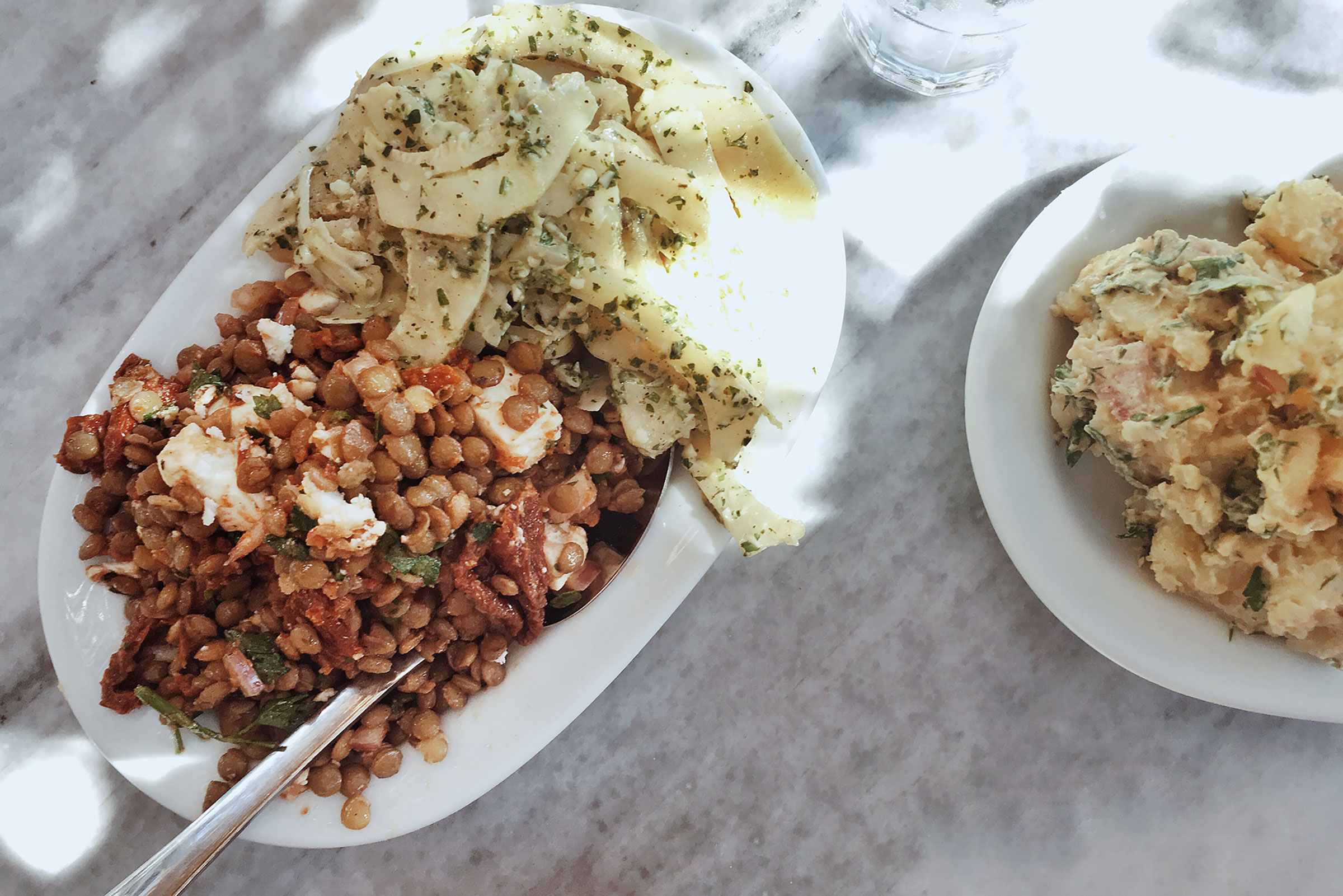 Everything, including the famous steaks and the pork chops, is cooked in the stone-built grill outside, while you can visit the small inside area to pick your salads from a vast variety of greeneries and cold dishes. - Secondary Image