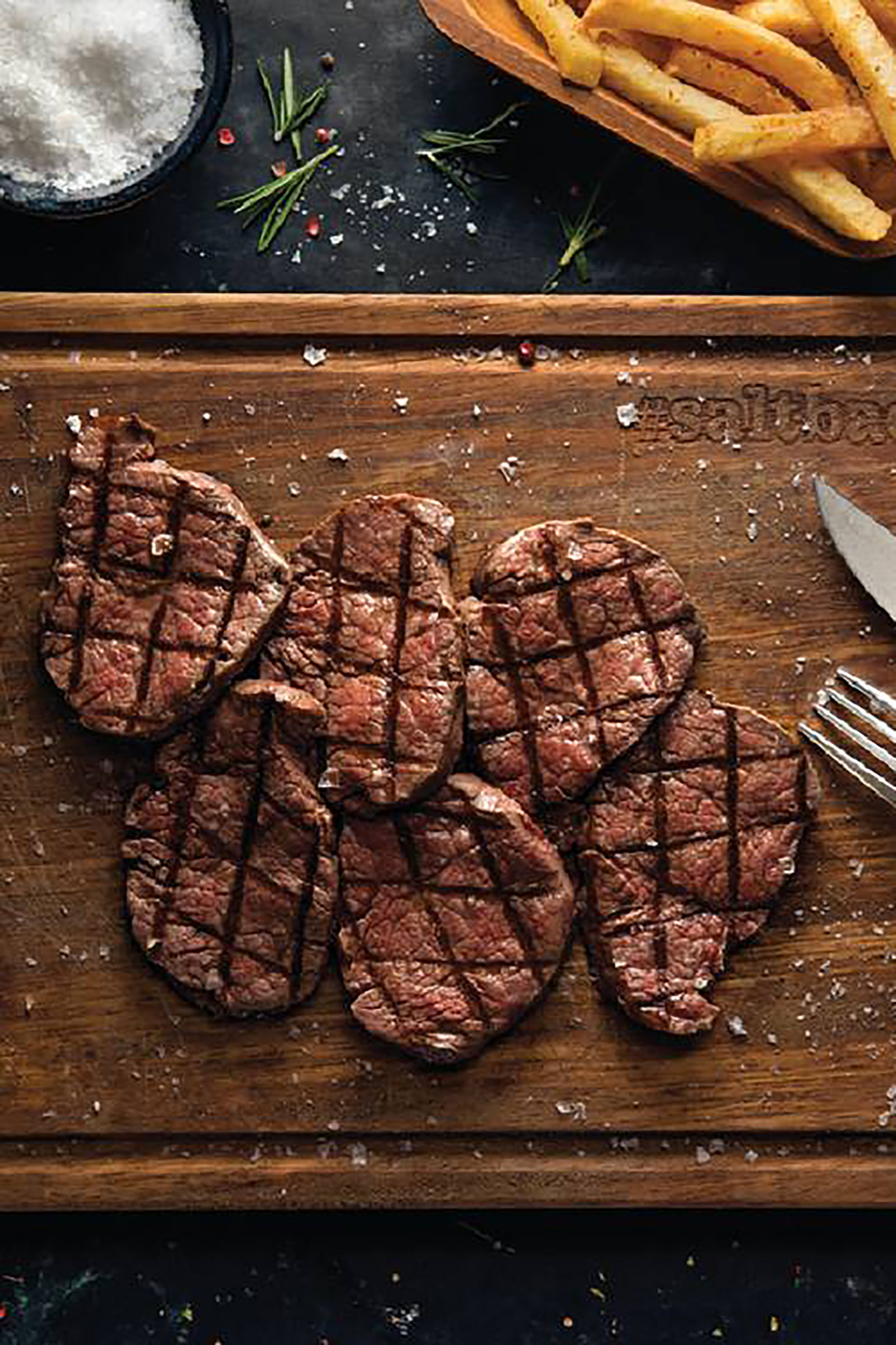 The Mykonos Town restaurant offers exquisite town and sea views, with a vast outdoor seating arrangement permitting for alfresco meat-centred feasts, frequented by celebrities, VIPs, and sworn meat-lovers alike. - Image