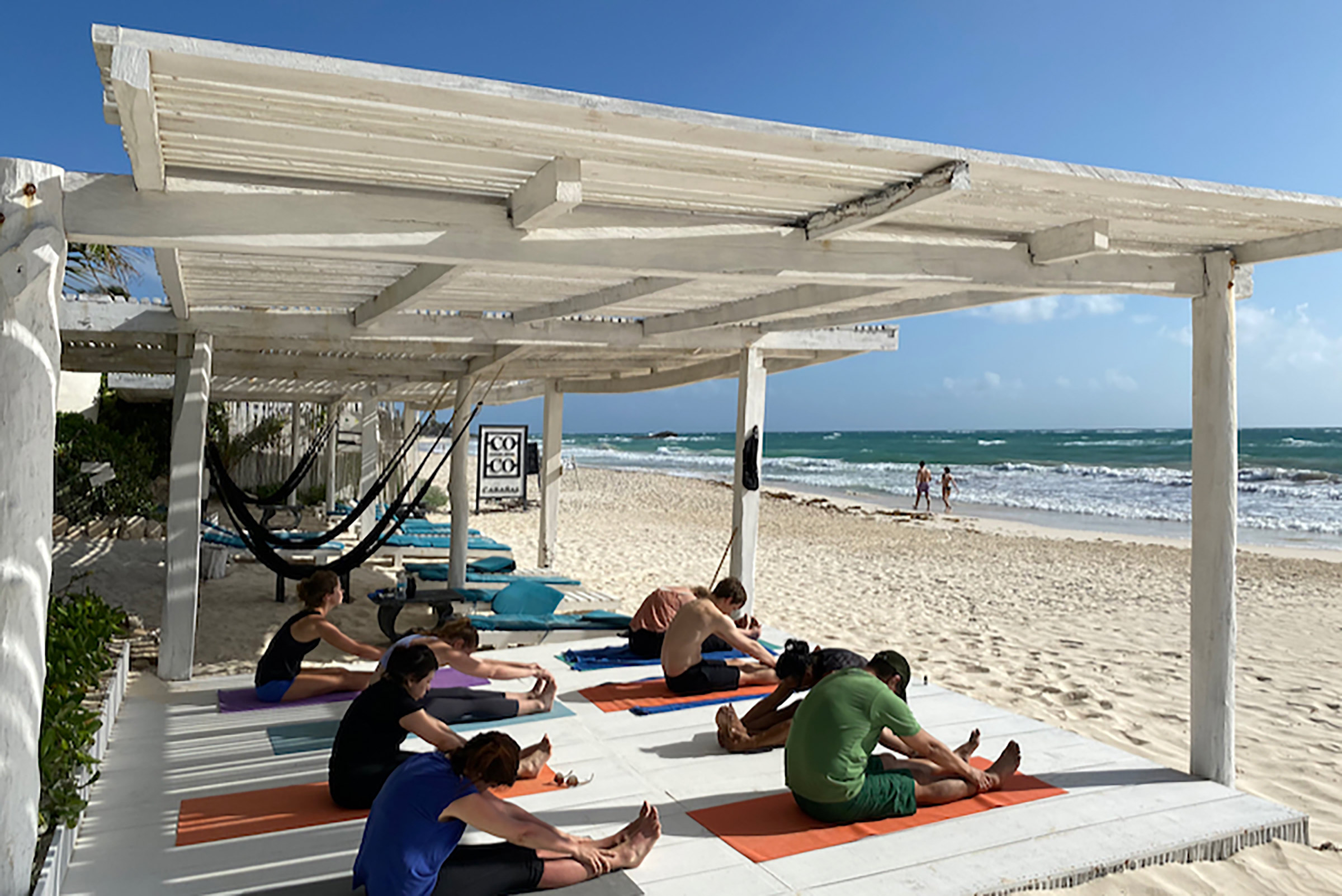 The zen zone is ideal for seclusion, serenity and connection with mother nature and stands closer to the Mayan sauna and the yoga deck, while the beach club zone offers the best beach vibes and is just a few feet away from the turquoise ocean and the famous Coco Beach Bar, where the social heart of the resort lies. - Secondary Image