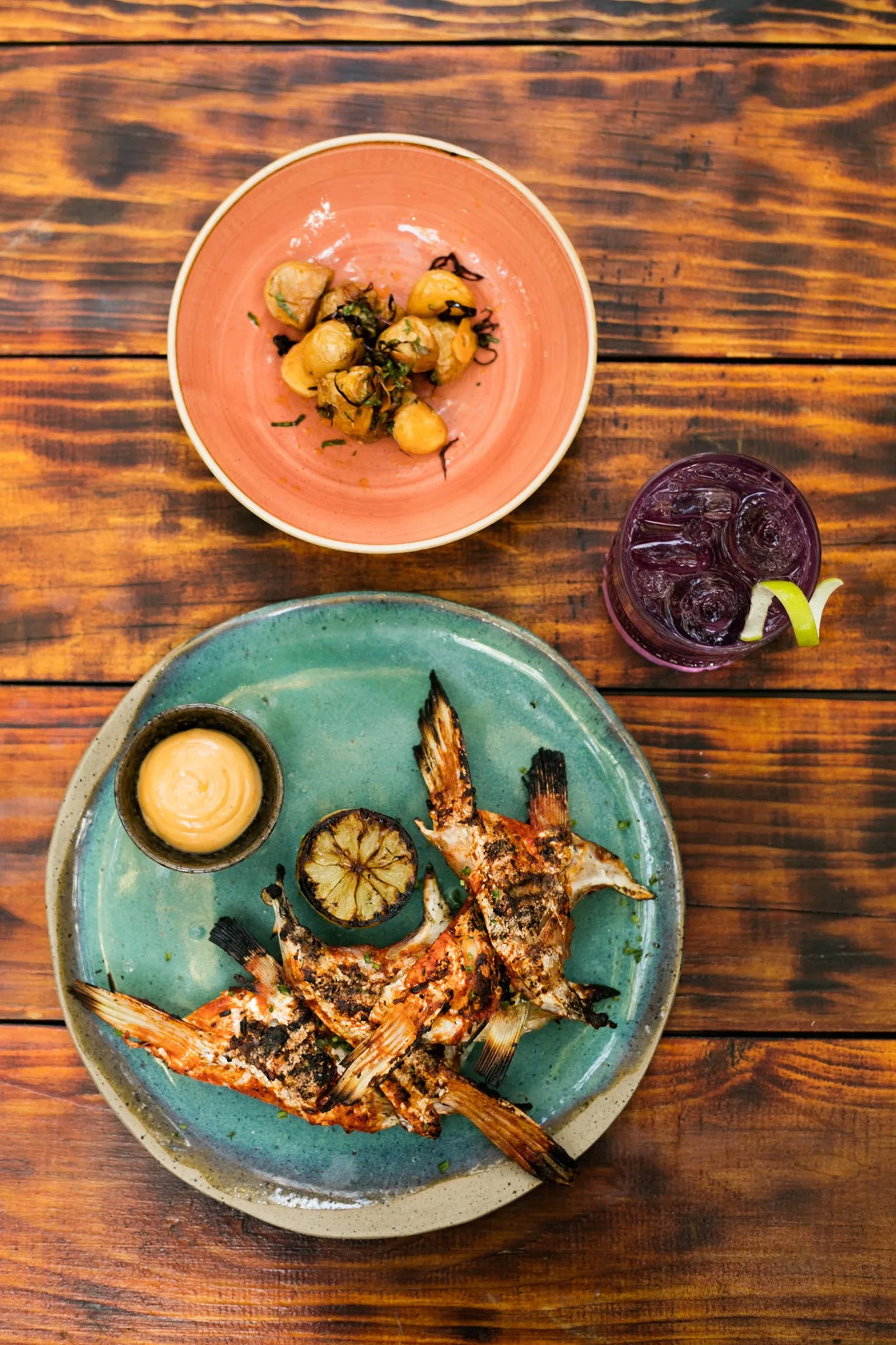 The best produce from the sea and the land takes its place over the wood-burning flames, offering guests a true taste of the local gastronomical culture and ways as they once used to be, way before it was cool. - Image