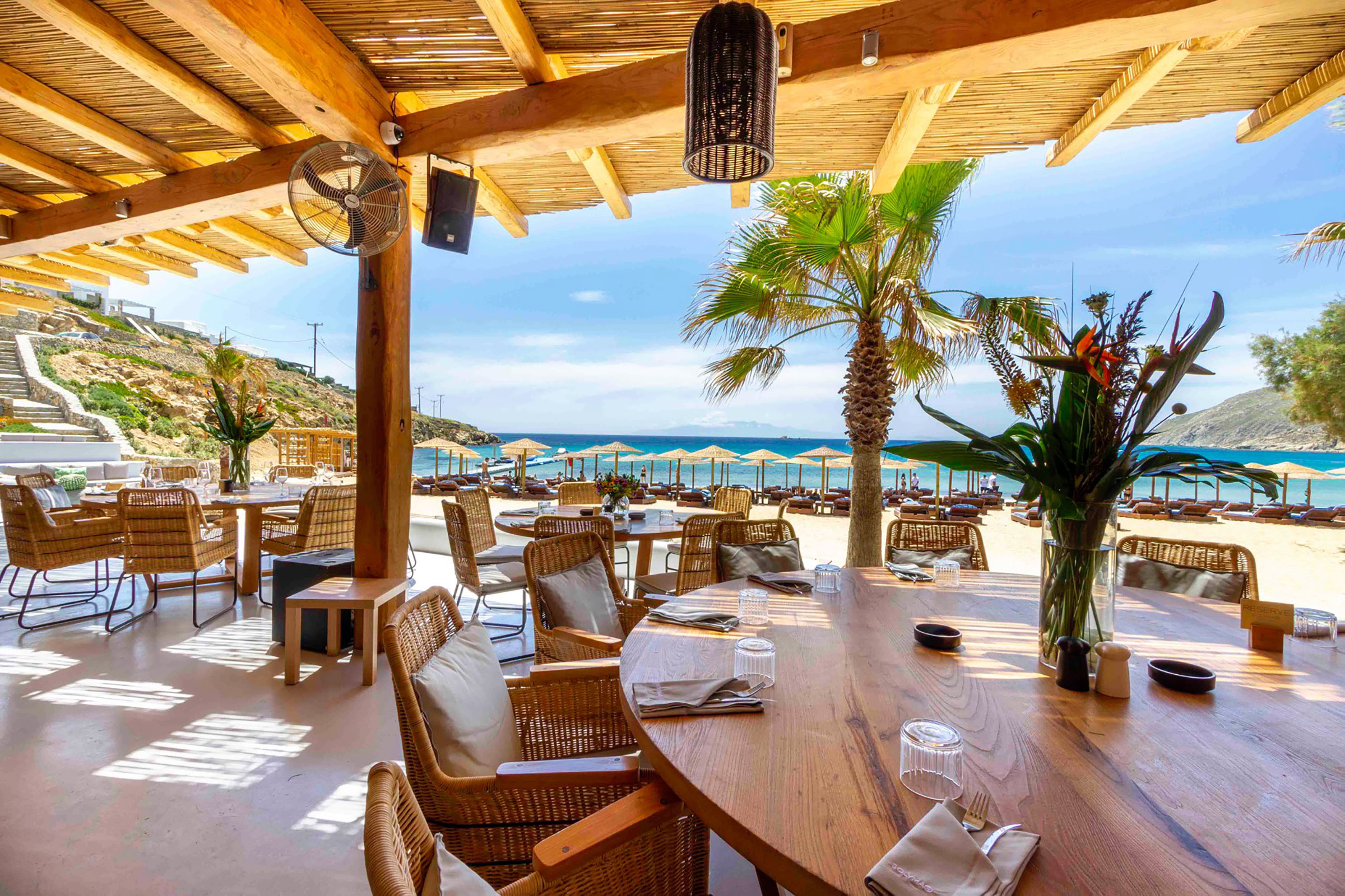 The cool-vibed restaurant combines Cycladic tradition with cultivated modern Mediterranean and international cuisine, serving the best of local produce in dishes that range from sushi rolls to ceviches and from Mediterranean black pork to traditional Greek pasta. - Secondary Image