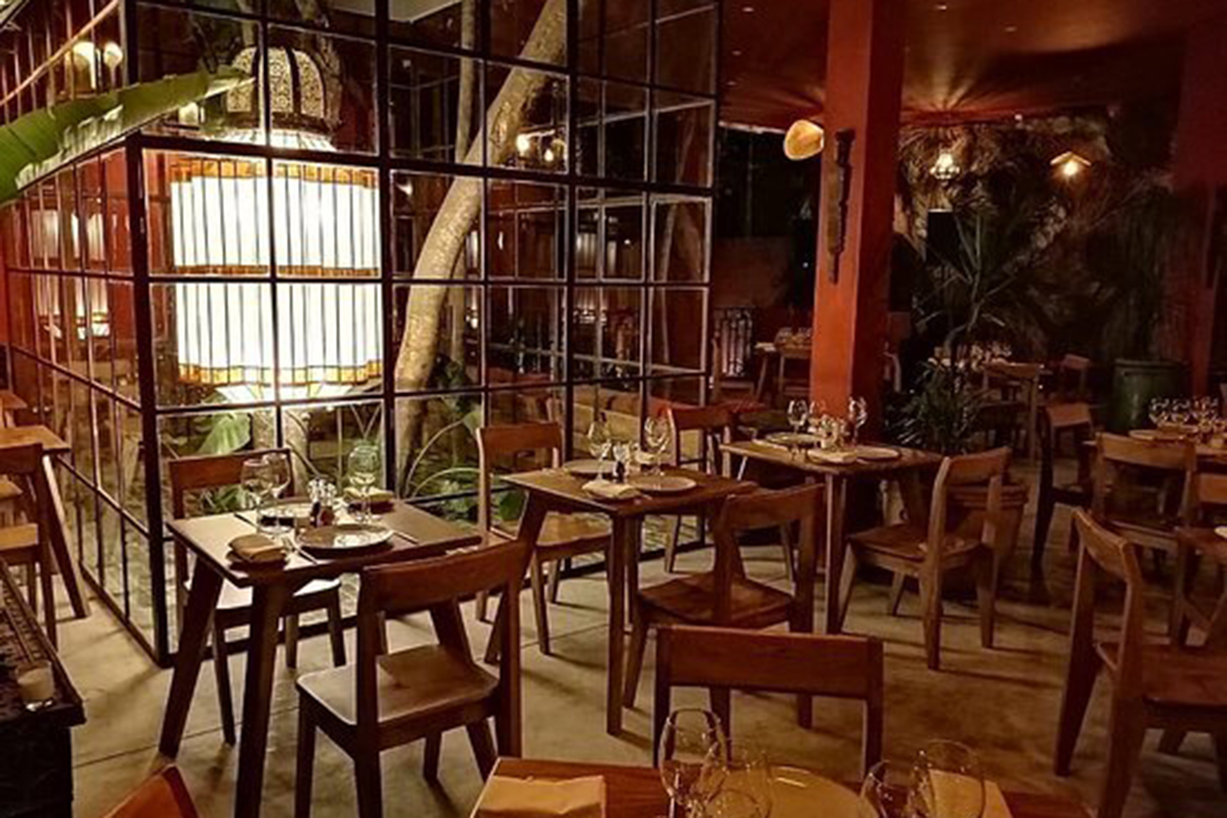 The famous “One thousand and one nights” tale unfolds in this beautiful restaurant and lounge bar in the heart of the Tulum jungle, introducing guests to the exciting delicacies and exotic thrills of Middle Eastern and Northern African cuisine in their most authentic form. - Secondary Image