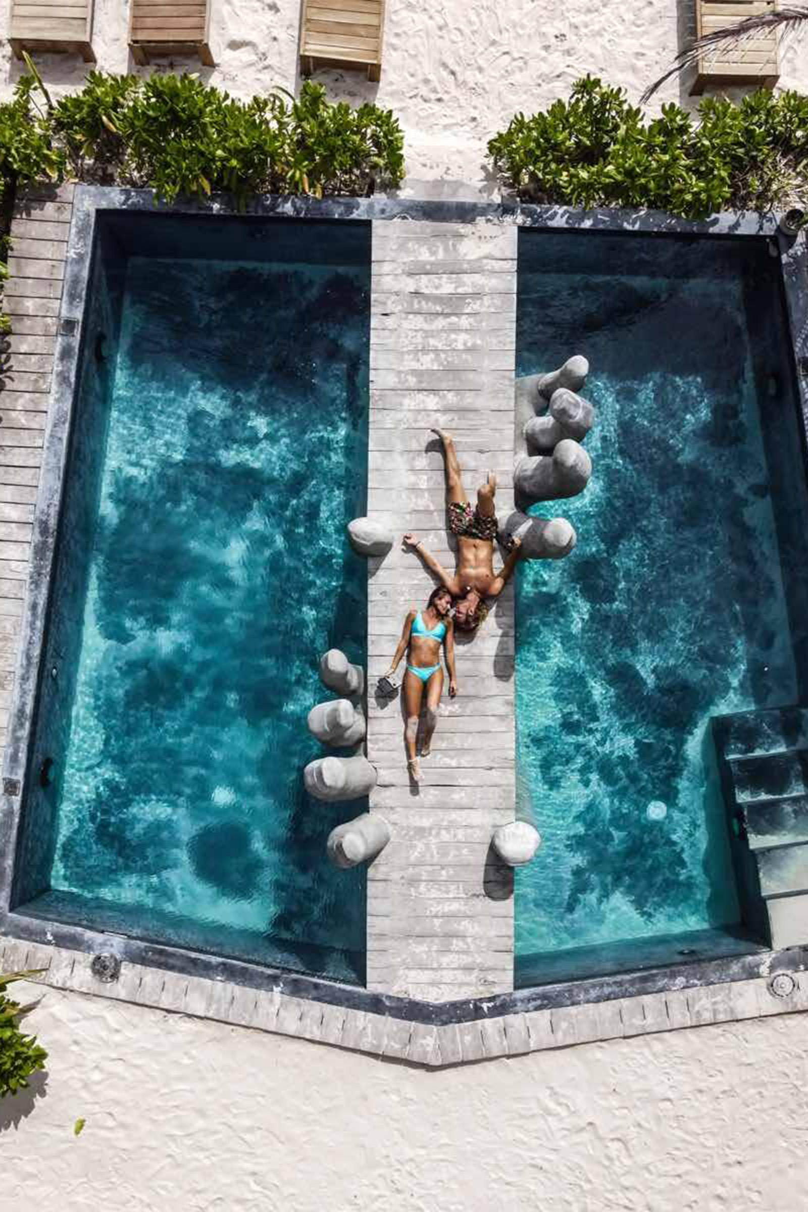 When reaching the entrance, a giant pair of wooden hands awaits to welcome you in the most mystical of ways and introduce you to the cool-vibed setting of this amazing beach club. Totally blending in with its natural surroundings, with wood, wicker, earthly tones and natural materials setting the design tempo, Vagalume will make you feel one with nature in the most luxurious of ways. - Image