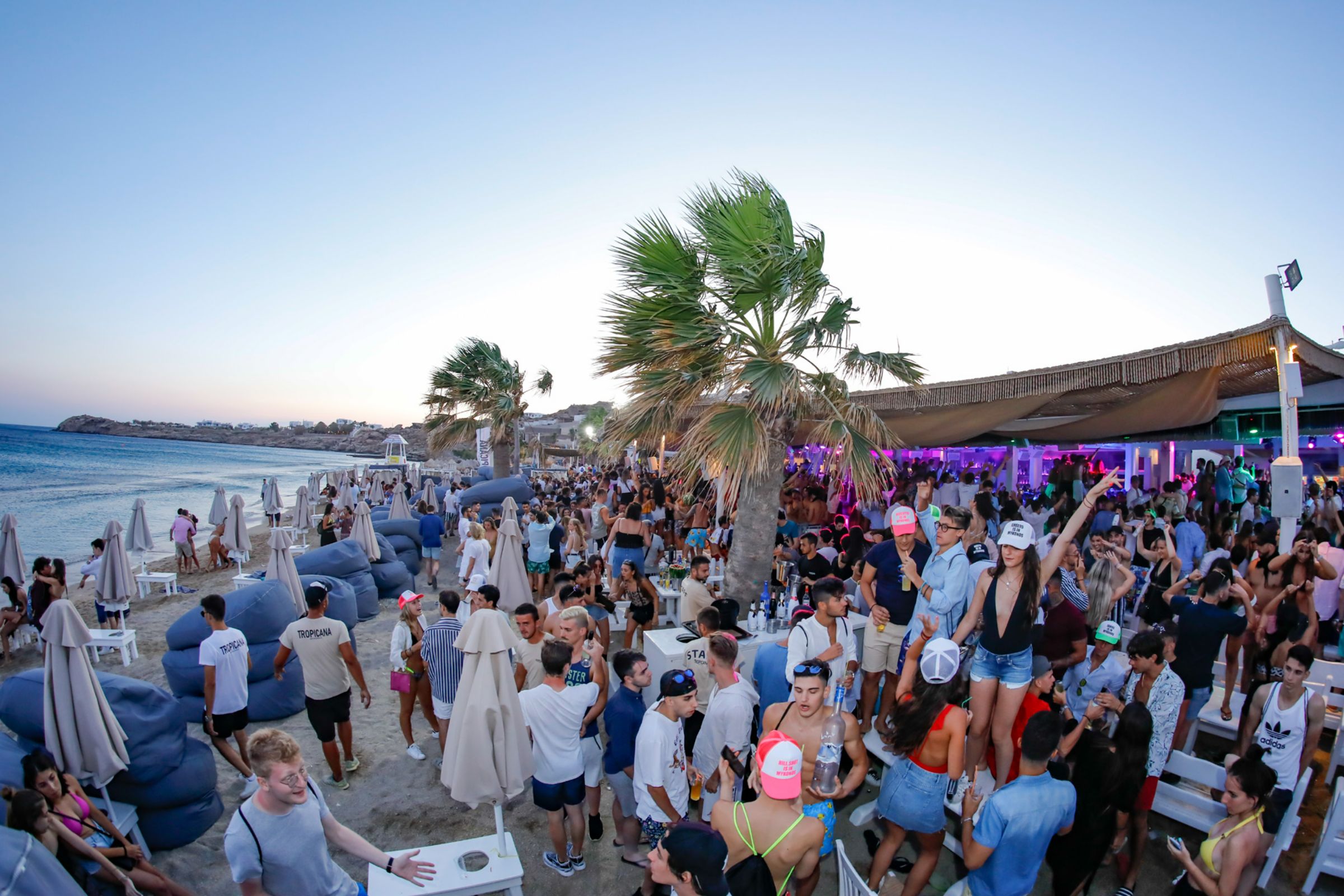 Sexy girls and super-tanned boys dancing on the bars and the tables, on the sand and the deck, professional dancers giving the tempo with sensuous moves and the amazing resident DJ set or the frequently invited world-famous guest DJs setting the place on fire. - Secondary Image