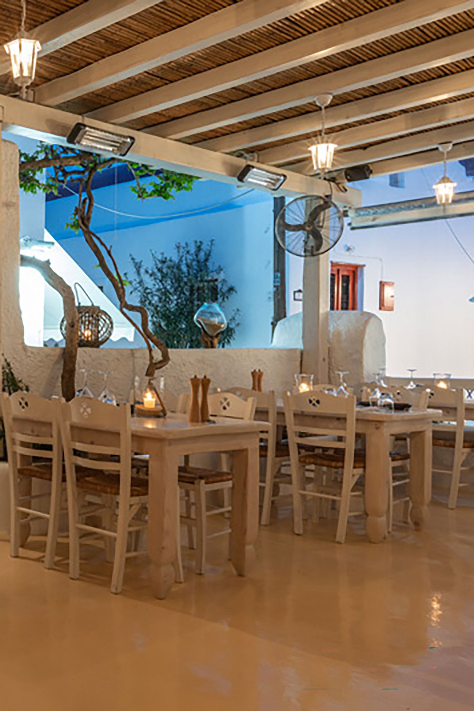 Hosted in a traditional Mykonian building of the early 20th century, just a breath away from the bustling Matoyianni, this ultra-cute, contemporary Greek restaurant offers amazing dishes that bring together the rich culinary history and gastronomic culture of Greece with the latest influences of the international restaurant scene. - Image