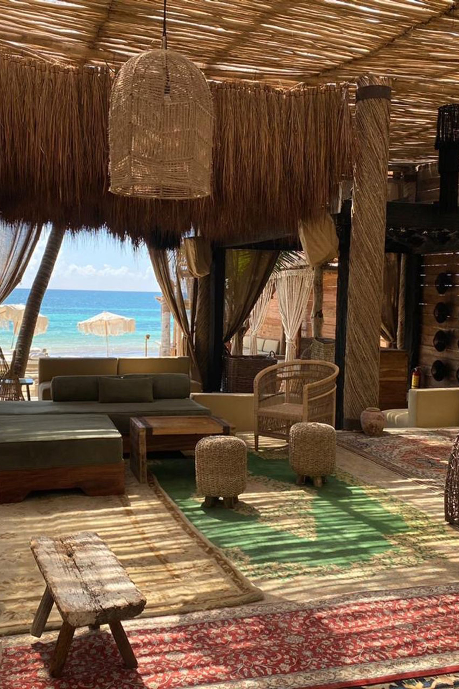 Walking down the jungle-like path from the entrance to the main restaurant, where Asian-styled carpets have been laid directly on the sand, you instantly get the feeling that here you will get the chance to totally unwind and relax. - Image
