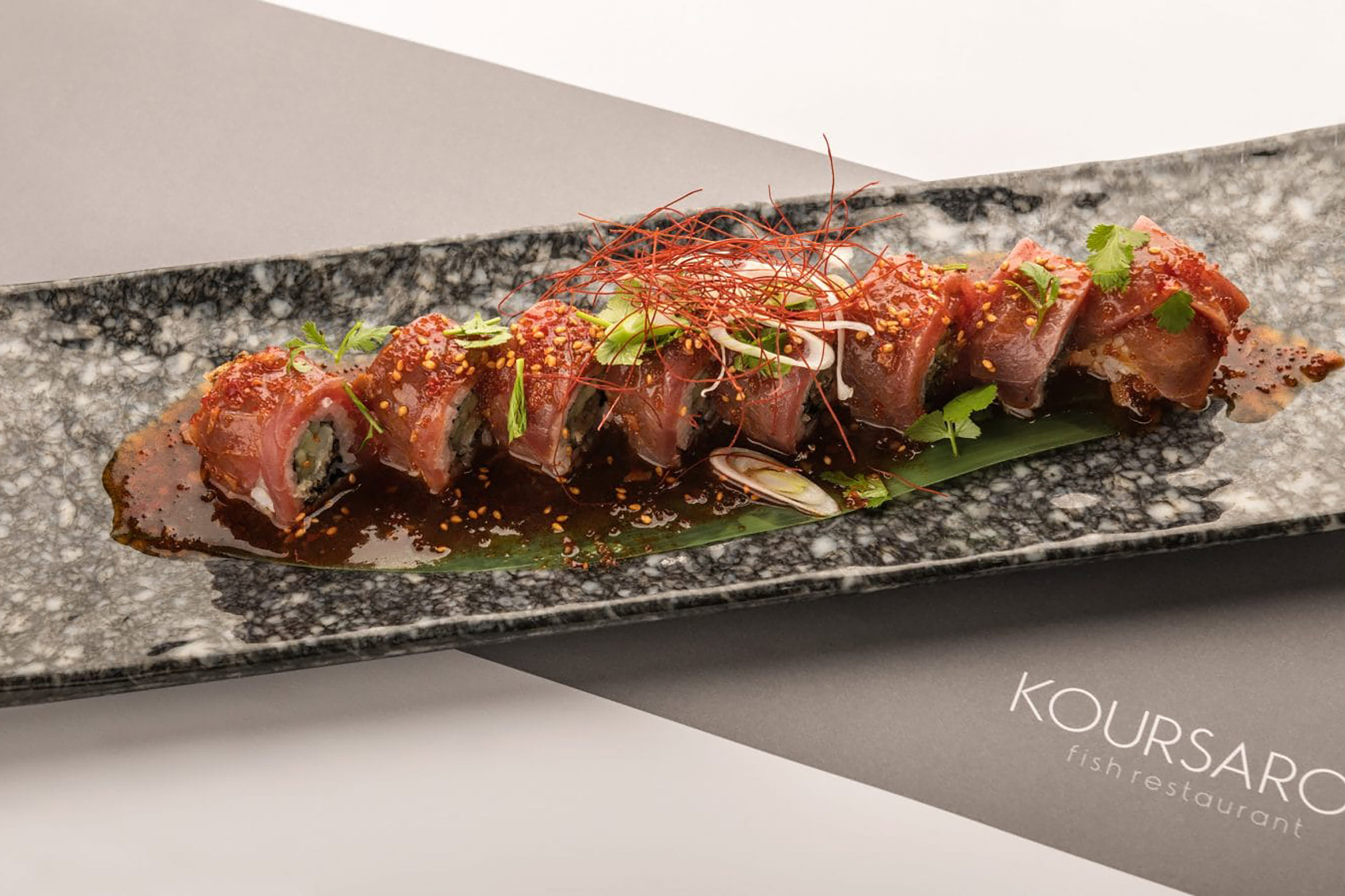 Delivers an upscale dining experience of Greek and Mediterranean cuisine, always staying in touch with the Asian superiority of sushi and cold, fresh-fish creations. - Secondary Image
