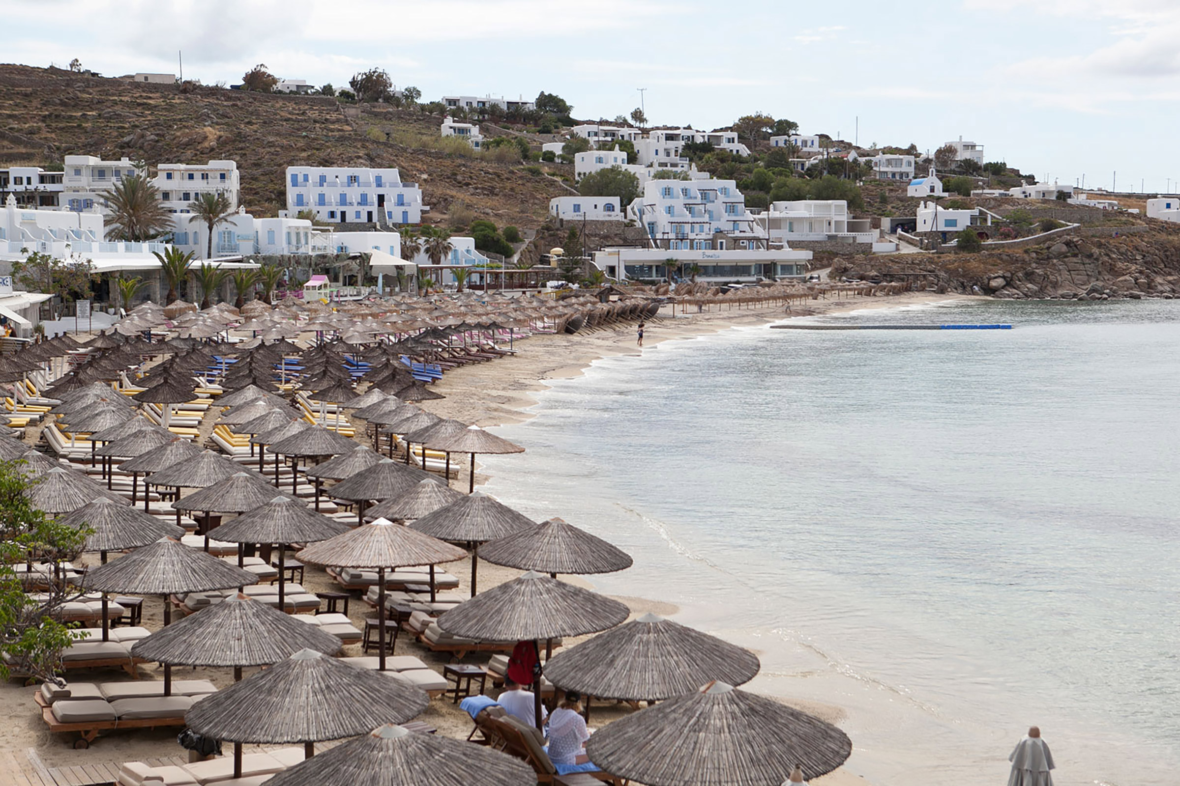 With its name meaning “the porch of Theodore”, this welcoming seaside Greek tavern displays a homey feeling with an elegant touch. - Secondary Image