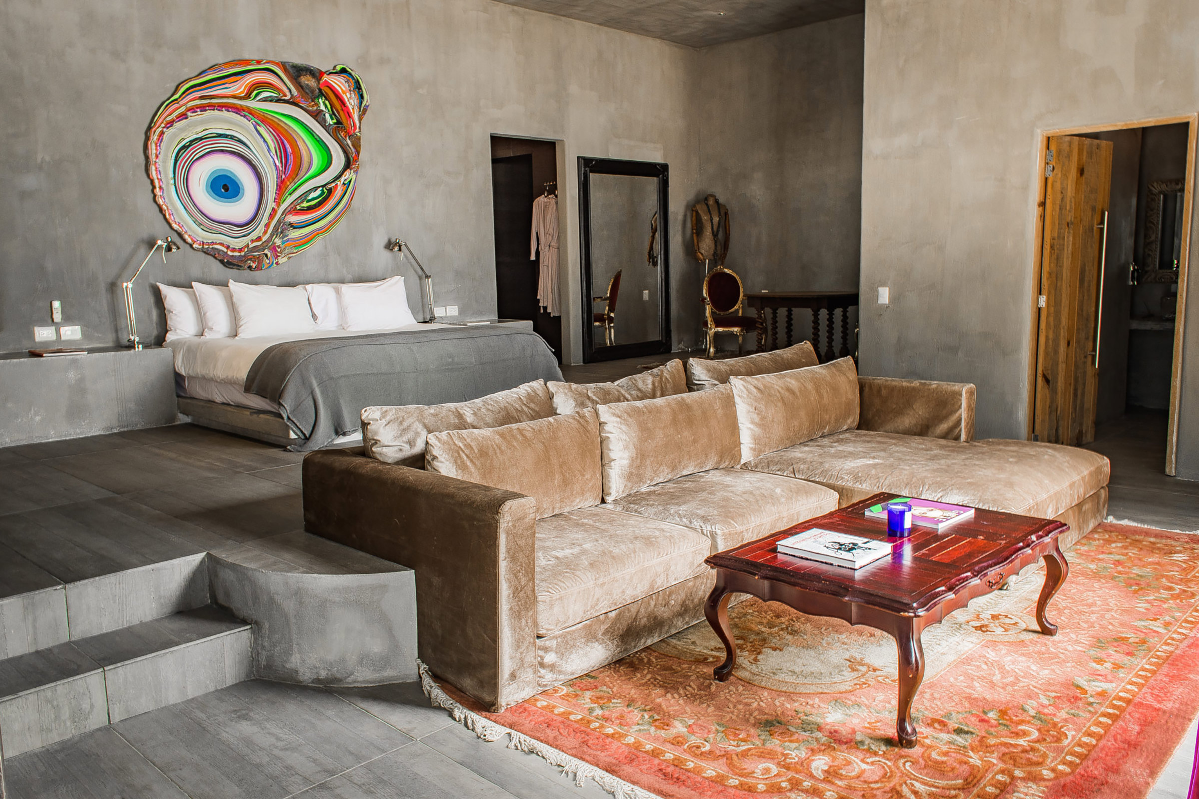 Mayan themes, natural wood, earthly colours, abundant sunlight, sustainable mentality, recycled materials, tropical gardens, and unblocked access to the exotic beach with the fine white sand and the crystal-clear turquoise waters are only some of the reasons to check in one of the top-notch design suites of this amazing resort. - Secondary Image