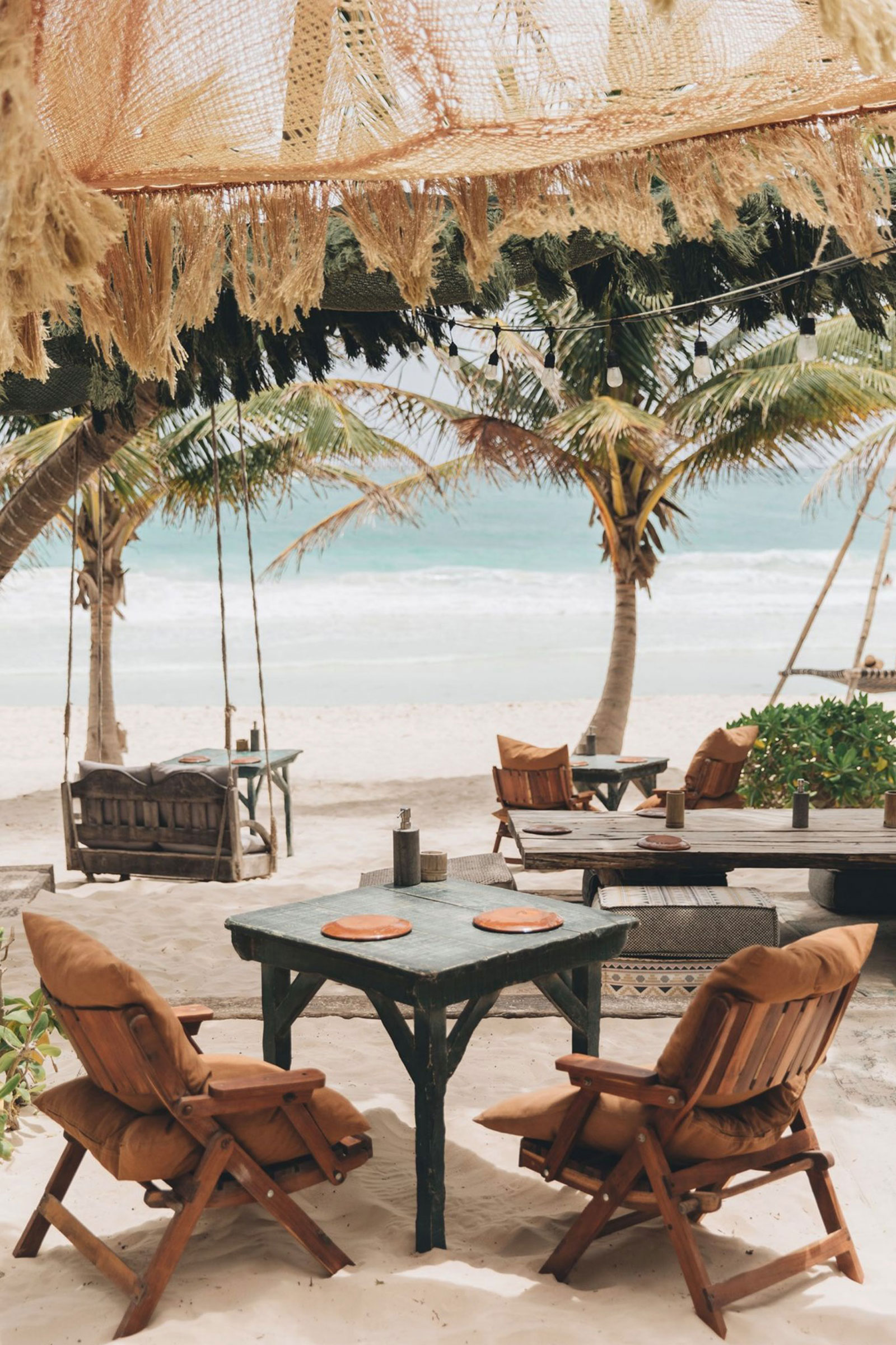 Here you will eat with your toes in the sand and your eyes on the sea, or around a long communal table celebrating togetherness and human warmth. La Popular is the best place, when seeking to dine al-fresco, literally with your feet in the sand; a beachside fish shack with a bohemian flair. - Image