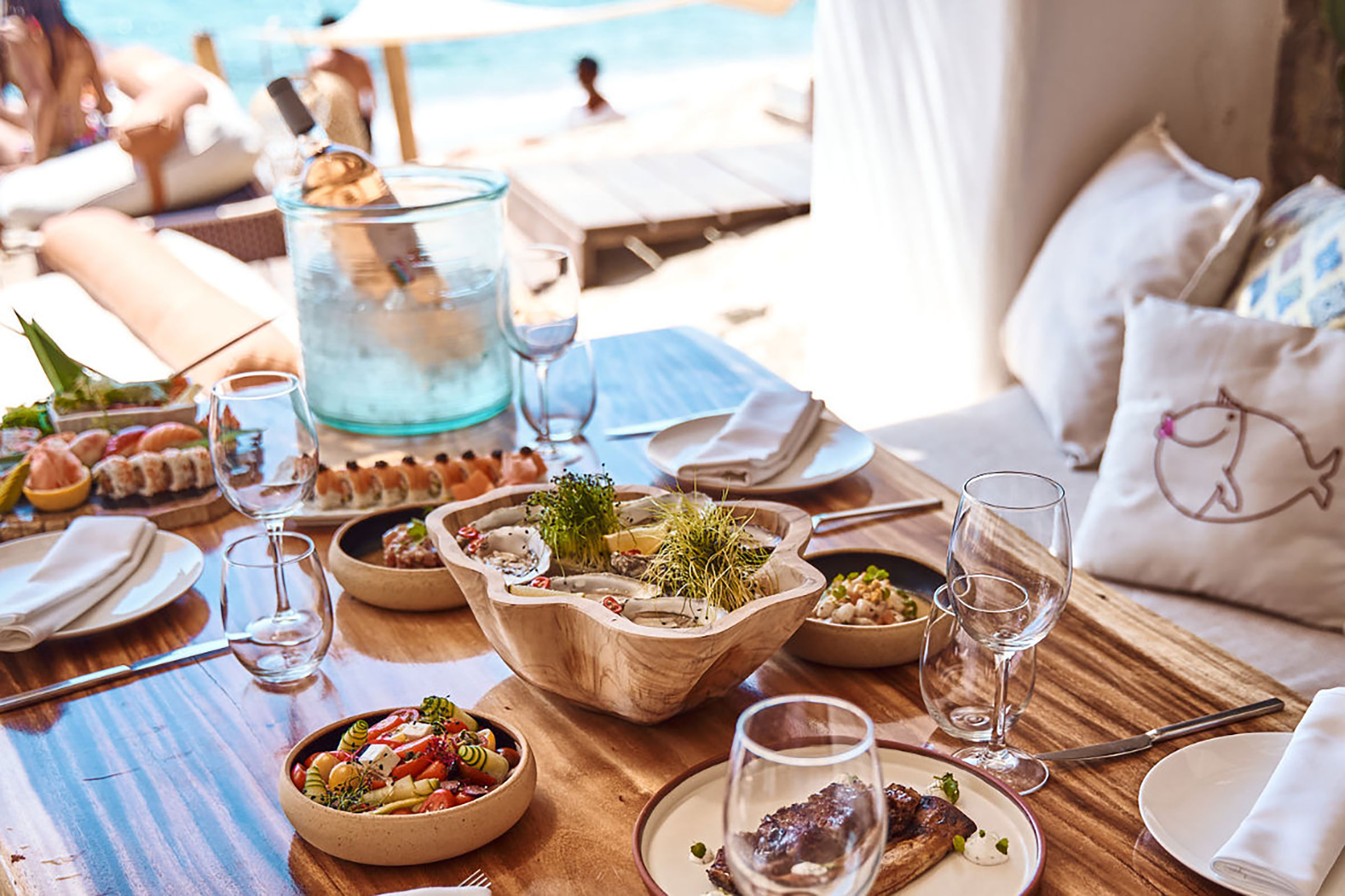 With a “hippie” approach to authentic Greek and Mediterranean cuisine, this unique beach restaurant serves eye-catching dishes made only with the freshest ingredients of the Aegean Sea and the Cycladic land, focusing on fish and seafood but making sure not to let meat-lovers down with some seriously delicious, organic meat dishes. - Secondary Image