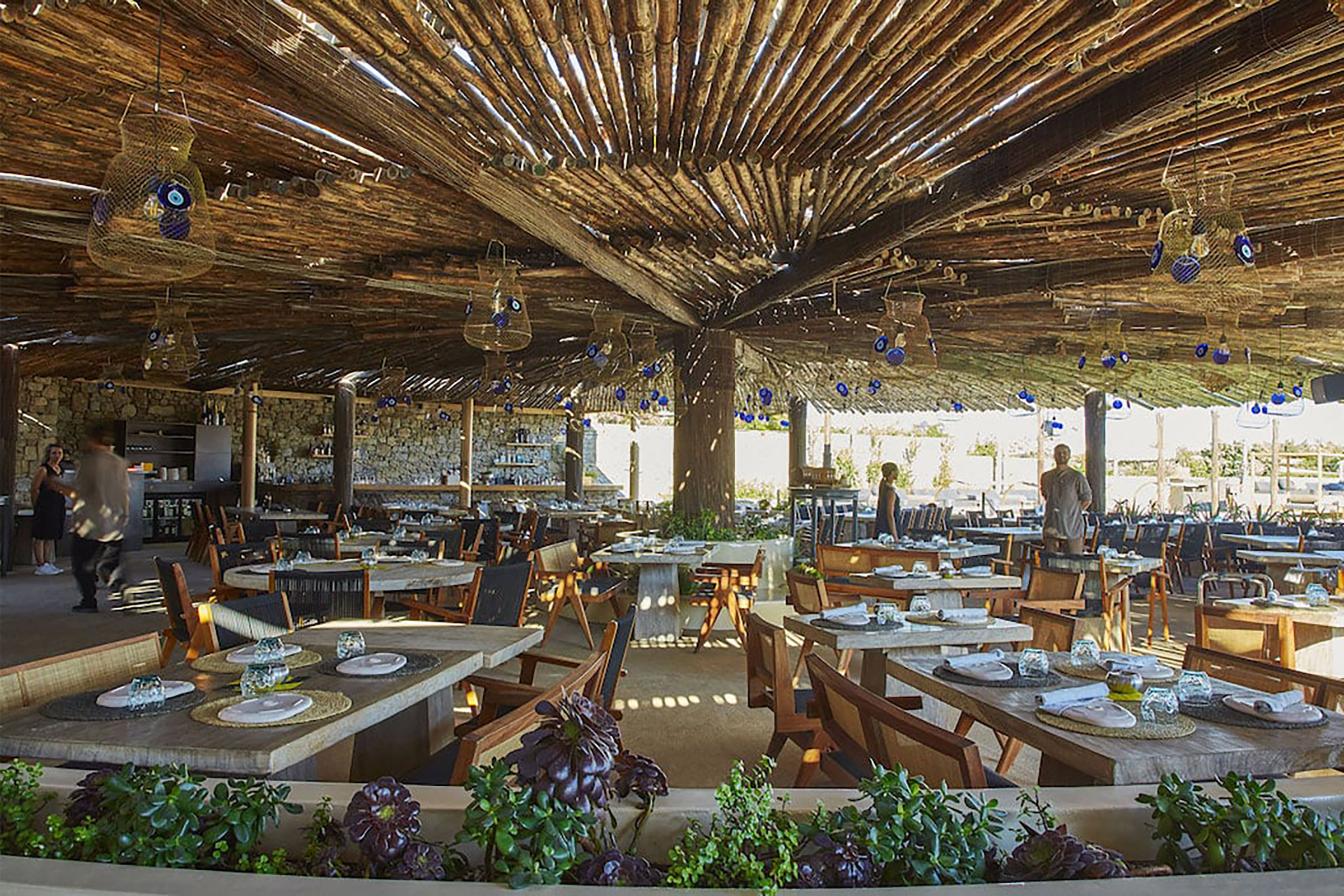 The 70 pool and beach cabanas, the numerous heavenly sunbeds, the 4 top-notch bars serving from inspired signature cocktails to vegan smoothies, the farm-to-table restaurant, and the exciting raw and sushi bar offer guests plenty of options - Secondary Image